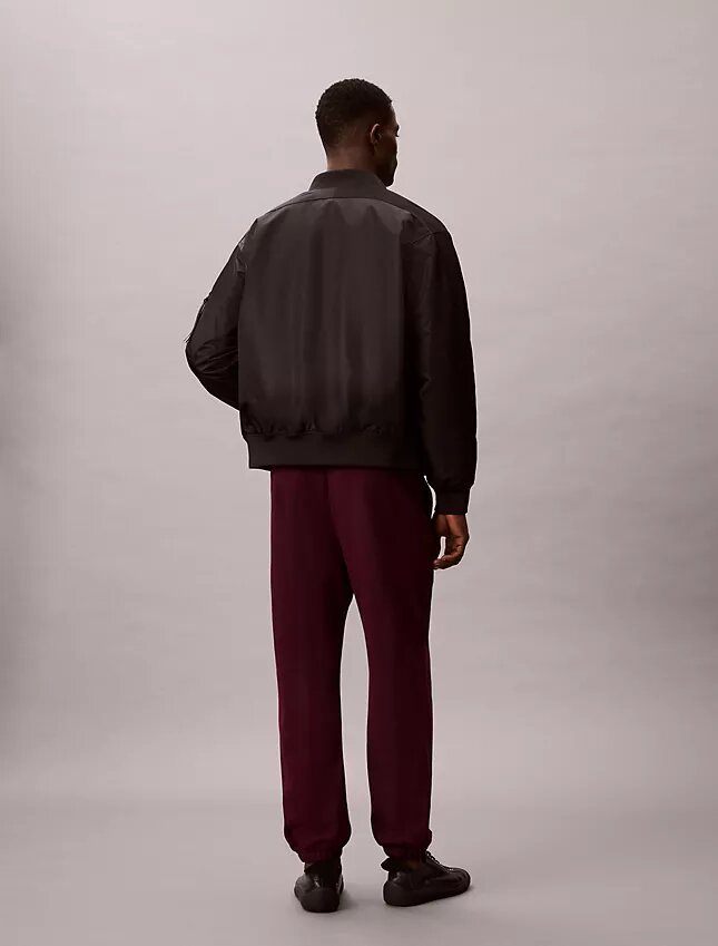 Pantalones de chándal con parche de monograma de felpa Pantalones de chándal con parche de monograma de felpa