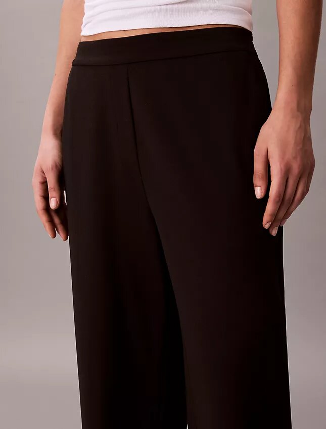 Pantalones de viaje de crepé elástico Pantalones de viaje de crepé elástico