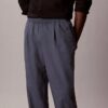 Pantalones sin cremallera con pliegues de mezcla de lino