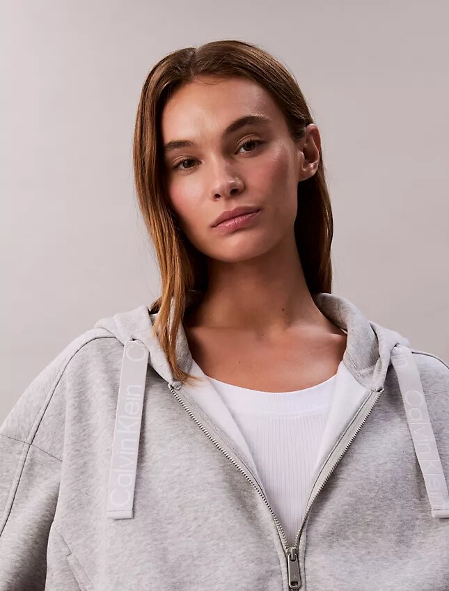Sudadera con capucha holgada de felpa con cremallera y cinta con el logotipo Sudadera con capucha holgada de felpa con cremallera y cinta con el logotipo