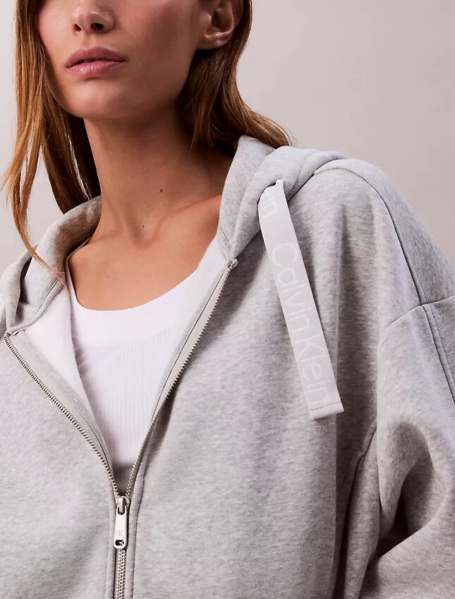 Sudadera con capucha holgada de felpa con cremallera y cinta con el logotipo Sudadera con capucha holgada de felpa con cremallera y cinta con el logotipo