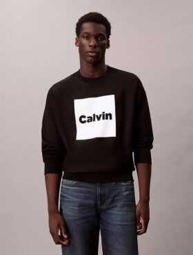 Sudadera holgada con gráfico de logo en felpa Sudadera holgada con gráfico de logo en felpa