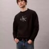 Sudadera holgada de felpa de primera calidad con logotipo Monogram Sudadera holgada de felpa de primera calidad con logotipo Monogram