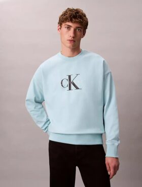 Sudadera holgada de felpa premium con logotipo Monogram Sudadera holgada de felpa premium con logotipo Monogram