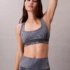 Sujetador deportivo de impacto medio con espalda nadadora y estampado deportivo moderno Sujetador deportivo de impacto medio con espalda nadadora y estampado deportivo moderno