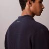 Suéter con botones y punto de malla Suéter con botones y punto de malla