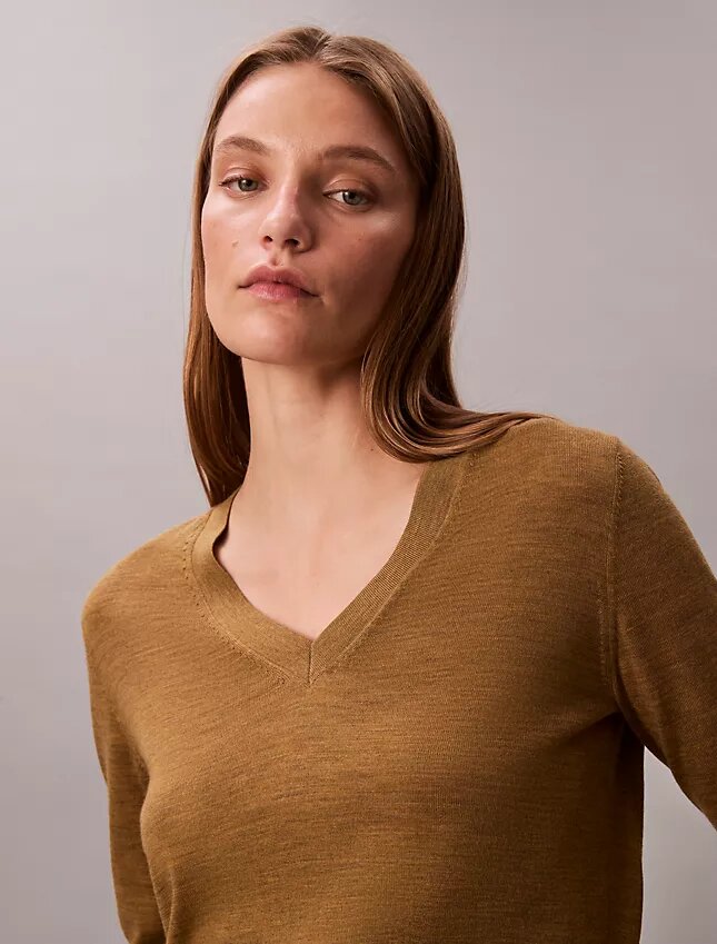 Suéter de cuello en V de lana merino Suéter de cuello en V de lana merino