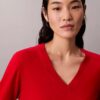 Suéter de lana merino con cuello en V Suéter de lana merino con cuello en V