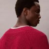 Suéter holgado con cuello en V de mezcla de lana merino Suéter holgado con cuello en V de mezcla de lana merino