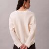 Suéter holgado de cuello en V de lana merino