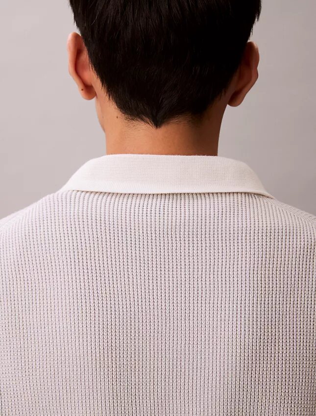 Suéter polo de algodón liso con tejido de panal Suéter polo de algodón liso con tejido de panal