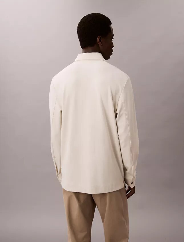 Suéter polo holgado de jacquard Suéter polo holgado de jacquard