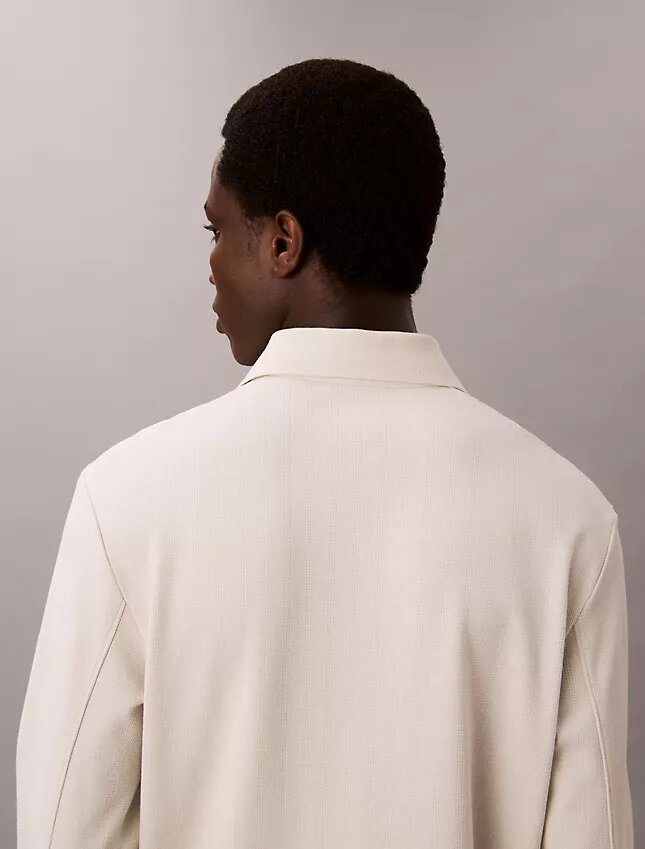 Suéter polo holgado de jacquard Suéter polo holgado de jacquard
