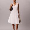 Vestido midi con bordado Vestido midi con bordado